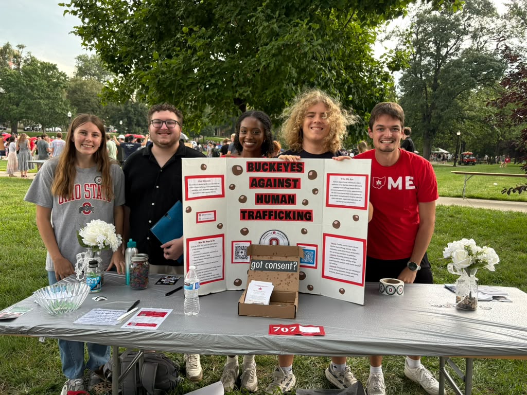 BAHT’s executive board standing behind their display and information table at Ohio State’s Involvement Fair.